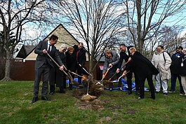 A ceremonial tree planting in recognition of Arbor Day. Sterling Heights has won 37 consecutive Tree City USA Awards.