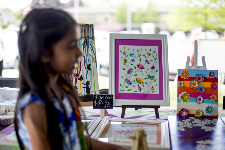 Meera Dani sells artwork at the Acton Children's Business Fair in Rochester