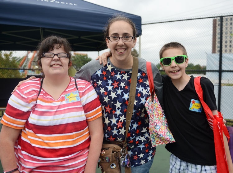 Samantha K., Stephanie Mooney and Owen Mooney pose for a photo at the sixth annual Special All-Stars Day at Dearborn’s Homecoming festival. Photo by Jessica Strachan,