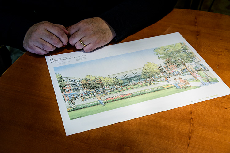 Bob Gibbs presents a rendering of Troy's decidedly urbanist Master Plan.