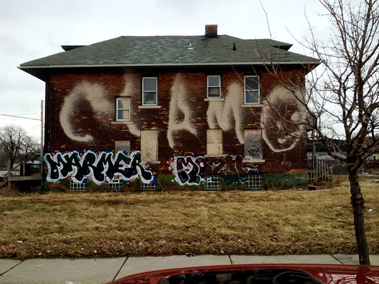 The Mary Ellen Riordan mural was originally conceived as a way to prevent taggers from vandalizing the duplex in North Corktown during its redevelopment.. Photo by John Zemke.