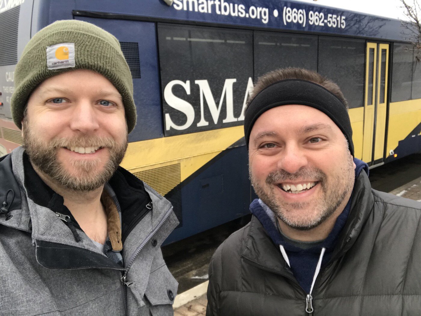 David Gifford and Mike McFall with a SMART bus in the background.