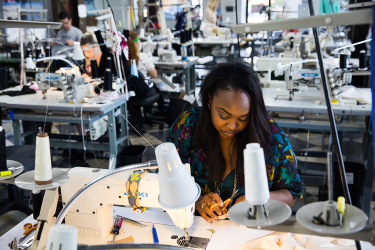 A garment worker at Detroit Sewn