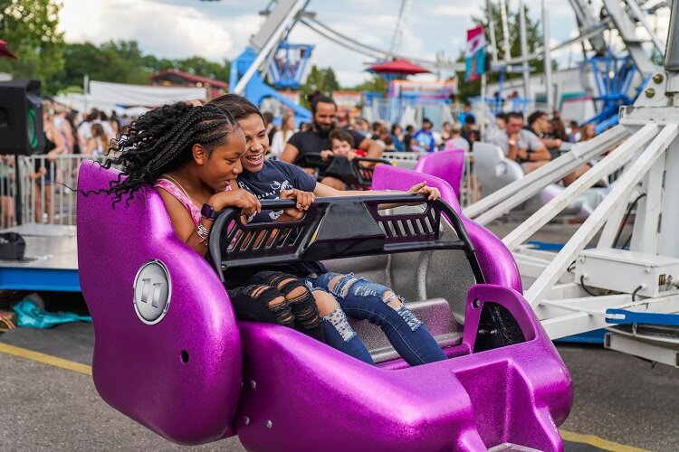 Visitors go for a ride during Sterlingfest.