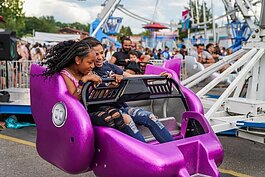 Visitors go for a ride during Sterlingfest.