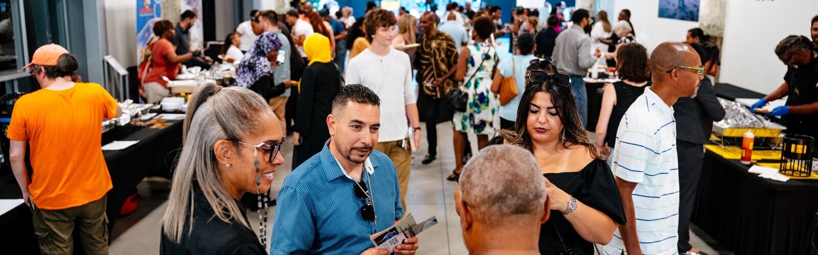 Attendees learn and mingle at the CDO VIP Expo event on July 29 at Newlab.