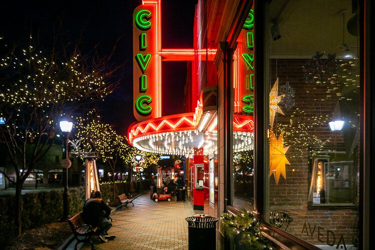 The Civic Theater often sells buckets of popcorn to customers enjoying the patio at the Farmington Brewing Company