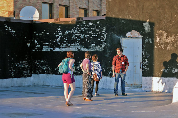 Members of Serendipity Seeds survey the garden space