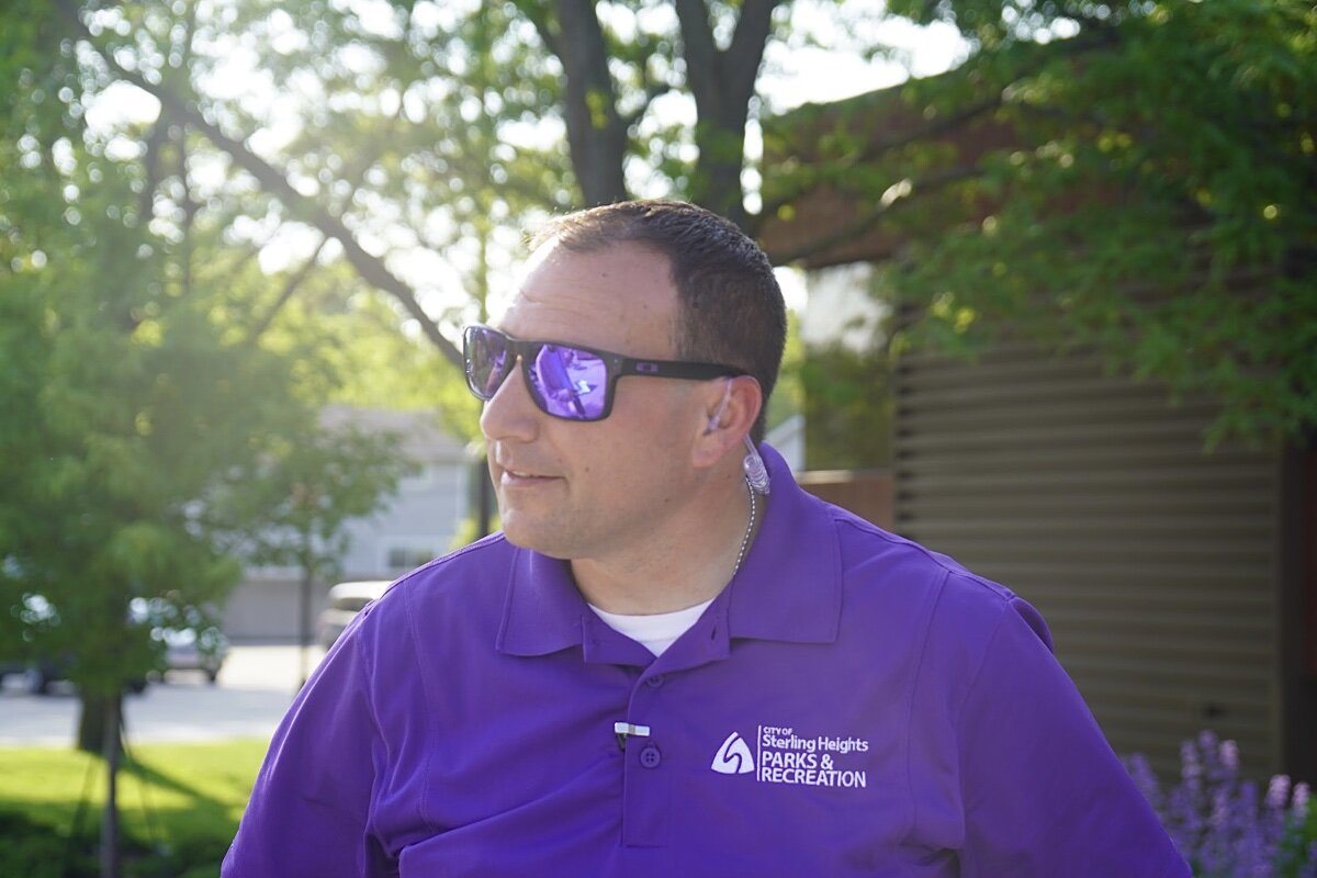 Parks and Recreation Director Kyle Langlois wears purple, symbolizing unity and a new initiative to make Park and Recreation employees more visible at events.