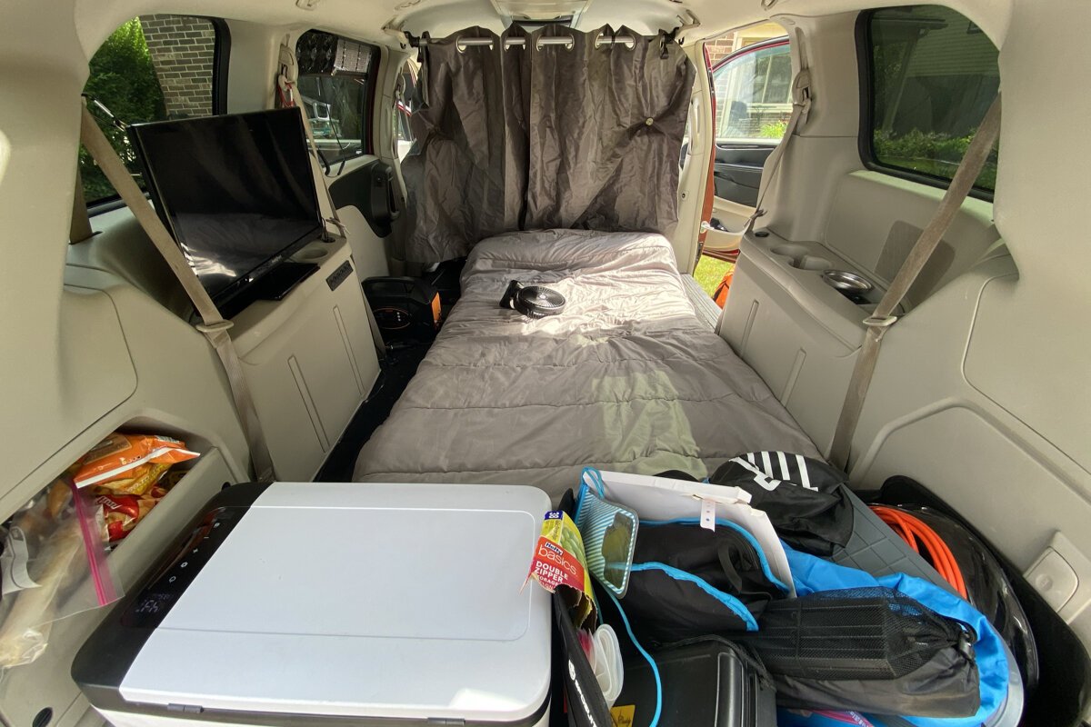 Delavan's DIY bedroom inside a 2013 Chrysler Town & Country.