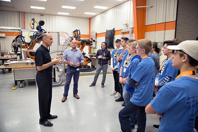Inside KUKA Systems in Sterling Heights for a Manufacturing Day event in 2019.