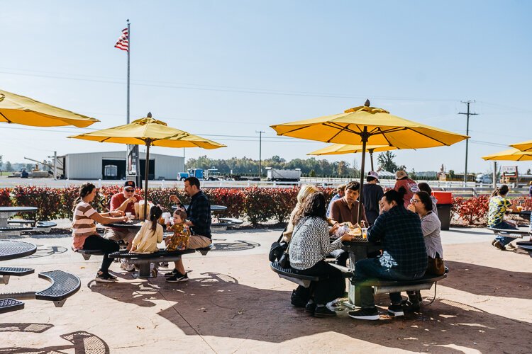 Visitors enjoy apple and cider at Blake's Orchard & Cider Mill.