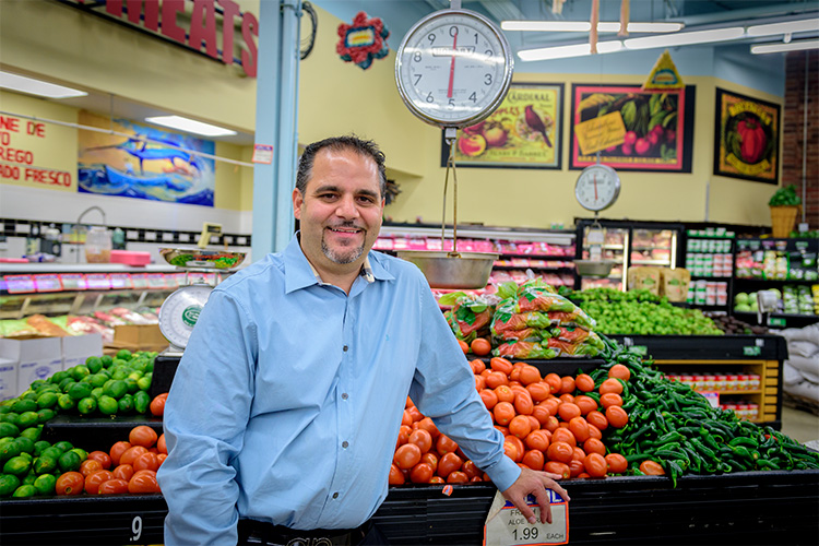 Jason Sylar at Carnival Market.  Photo by Doug Coombe.