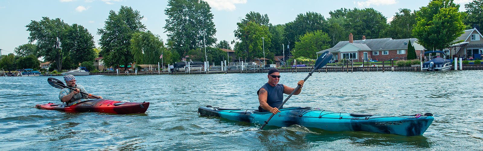 David Sands and Hans Dengler paddle the Clinton River