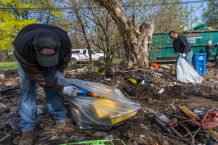 This huge pile of trash helped bring Modern Housing residents together for a cleanup effort. Photo by David Lewinski.
