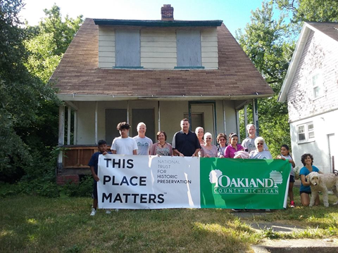 Volunteers in Pontiac's GM Modern Housing neighborhood.