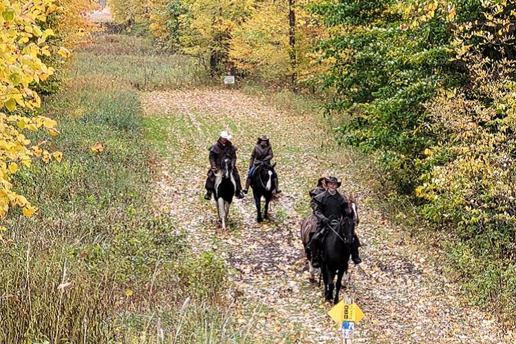 Members of the Wolcott Riding Club ride at Wolcott Mill Metropark.