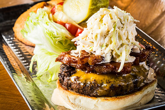 Monk's Burger with BBQ Pork Belly, 5 Year Cheddar, and Coleslaw