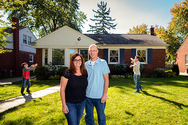 Jenny Buchman and her family at their home in Royal Oak