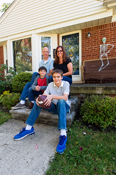 Jenny Buchman and her family at their home in Royal Oak