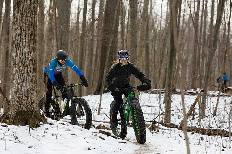 Rick and Jenn Wetherald bike fat tire tracks weekly during the winter to spend time outdoors with each other. In the summer, they switch to mountain bikes. 