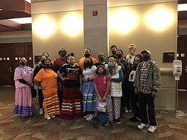 Miigwech, Inc. members dressed in traditional attire addressed the Michigan Independent Citizens Redistricting Commission at a public hearing in Lansing in October.