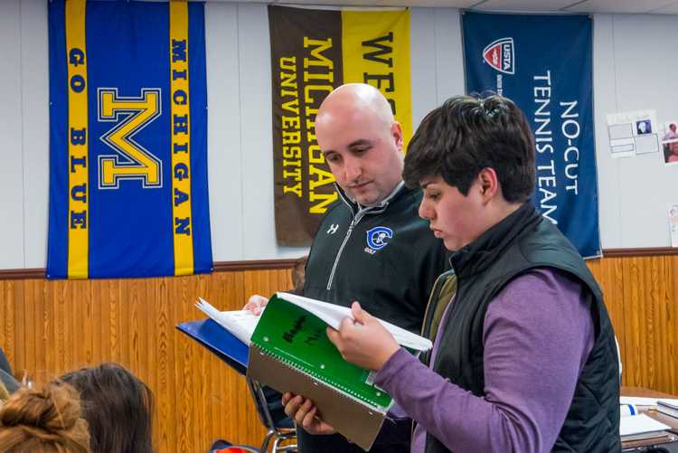 Giorgi helping a student