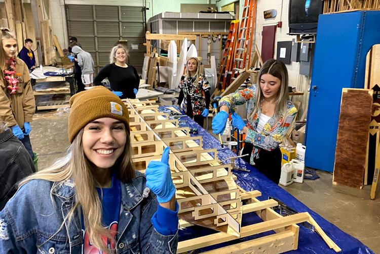 A woodworking class at Henry Ford II High School are gaining a reputation for their unique paddle board designs.