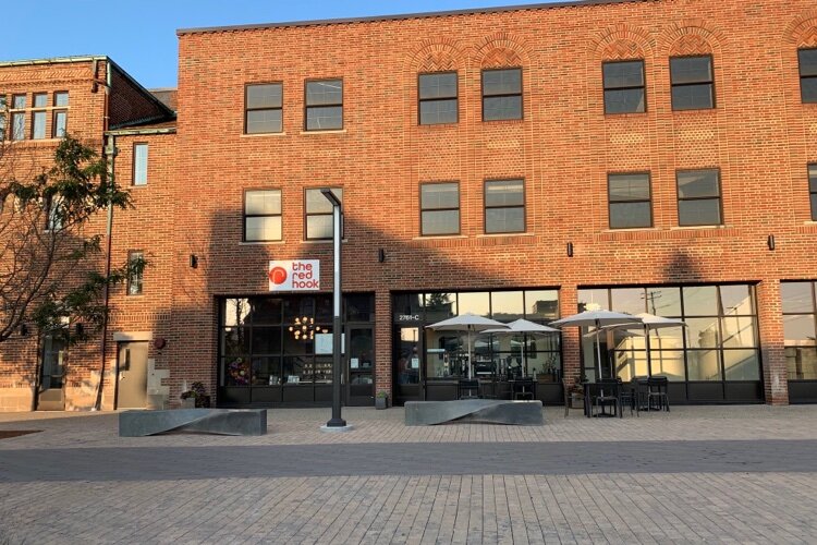 The Red Hook storefront, facing the Dennis Archer Greenway.