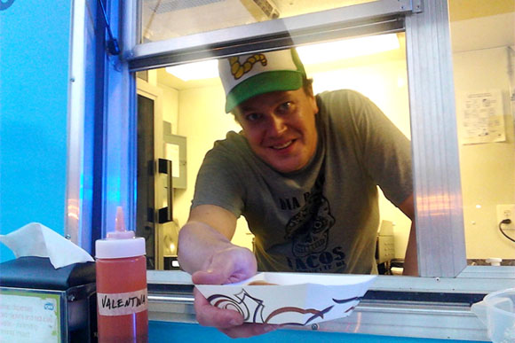 Mike Walker serves up tacos in Marquette.