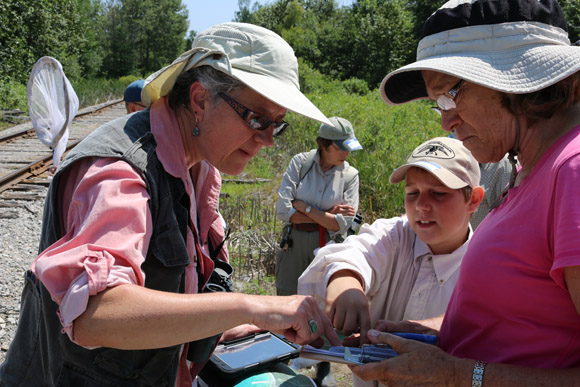 Students, scientists and community volunteers work together at Negwegon State Park.