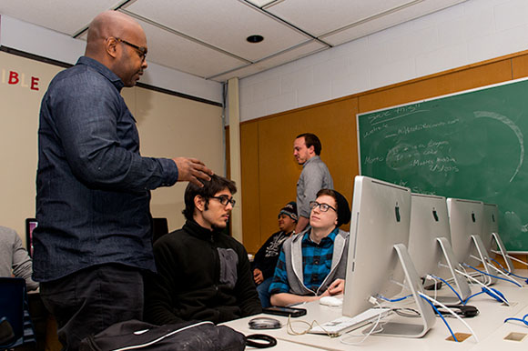 Pathways to Success co-principal Tyrone Weeks working with students.