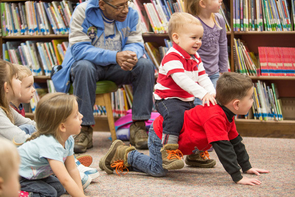 Some kids prefer to act out the story.