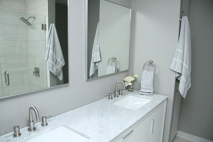 This bathroom features two sinks.