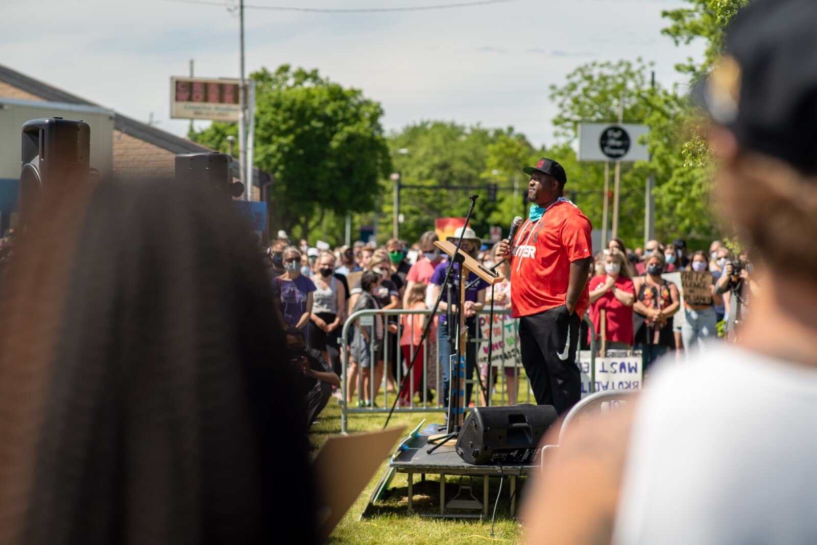 NAME speaks to a crowd in Midland on June 7.