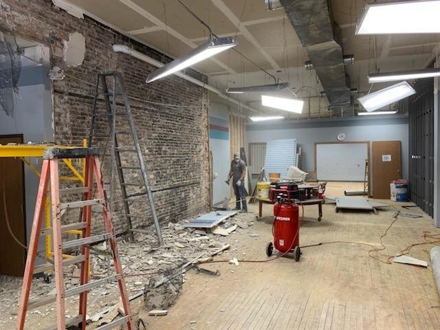 In progress: Working to expose some of the original brick.