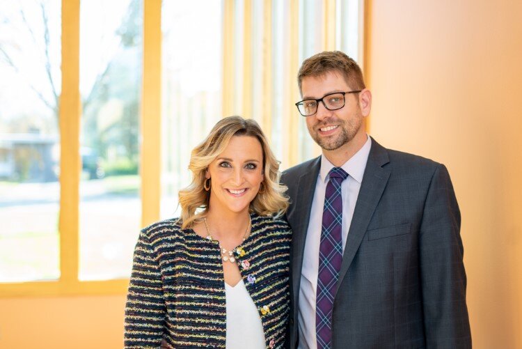 Jamie and Daniel Broderick stand in their new workspace.