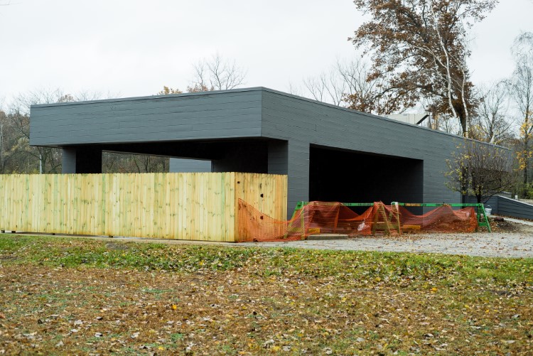 The progress on the exterior of the building, which has now been painted a blue-gray from it's original brown.