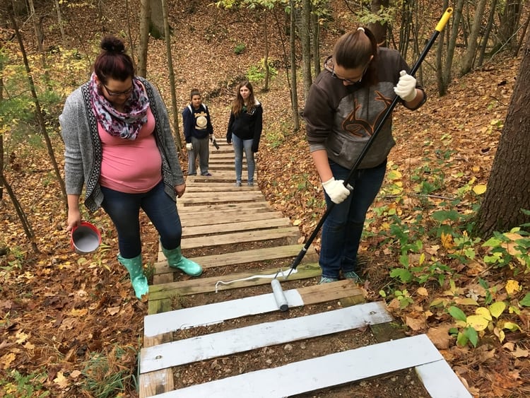 Students completing a service project