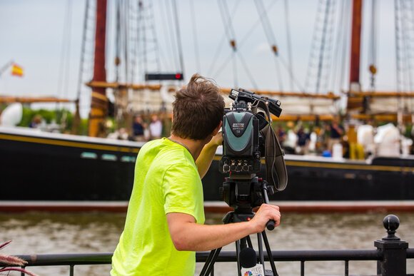 Professional and amateur photographers and videographers greeted the ships.