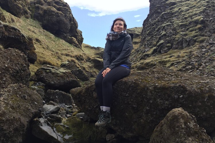 Every other year, Crystal makes it a point to go on an international adventure. This photo was taken on a trip to Iceland in 2017, where Crystal enjoyed hugging stray cats, cawing at birds, and climbing many, many rocks.