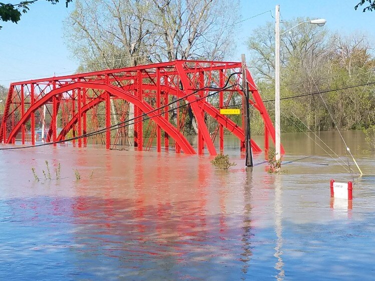 Flooding over the deck of the Currie Parkway Bridge, May 21, 2020