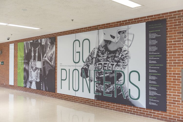 Public art and graphics proudly displayed on the walls of Delta College are part of an effort to help students and visitors feel a connection to the institution.