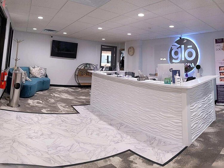 Meko Price's business, glō SKIN SPA, is located on Eastman Avenue. Prior to any treatment, clients enter the consultation room. There, they can see a polarized view of their face and skin before discussing their skincare goals.