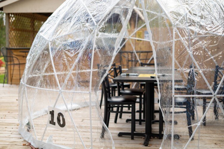 The Creek Grill now has several "igloos" placed throughout their outdoor seating area. The round, enclosed plastic spaces provide seating for groups up to eight.