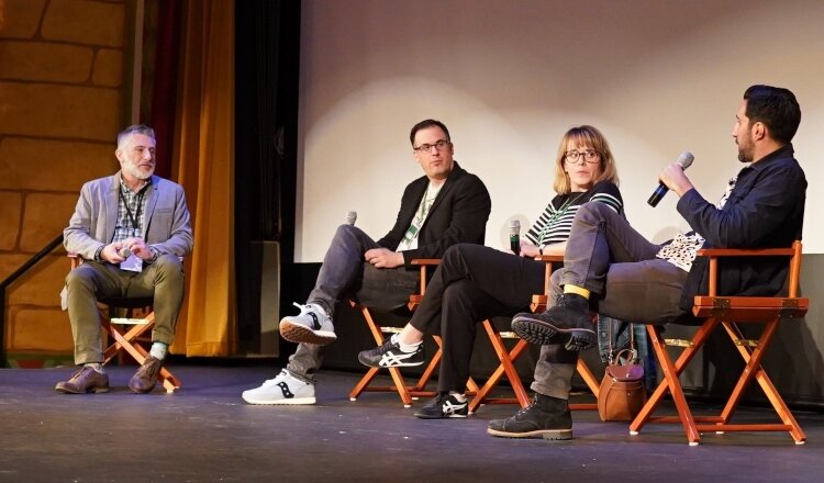 Festival Director Alan LaFave, at left, leads a panel discussion after a film during the 2019 festival.
