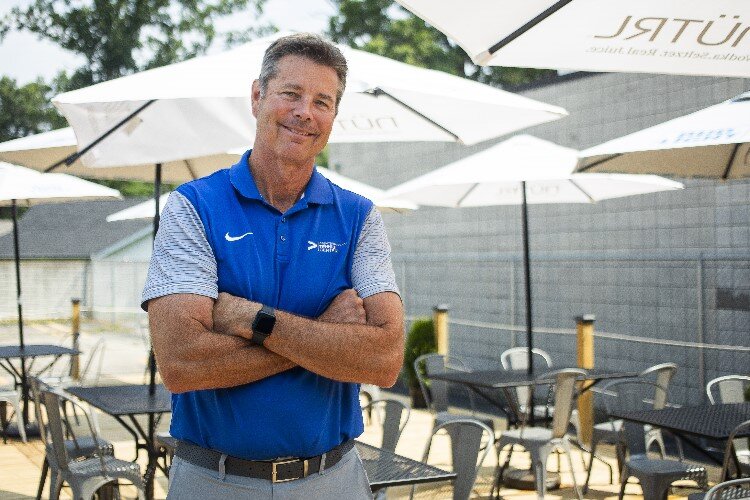 Frick's Sports Bar co-owner Jeff Rekeweg poses for a portrait on the back patio at the restaurant in Midland.