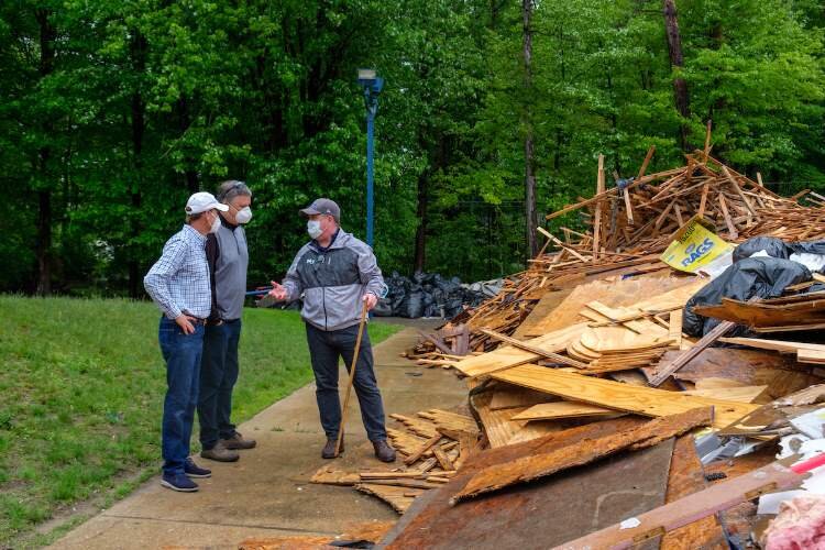 Kent MacDonald, Northwood president, assessing the flood damage to the university.