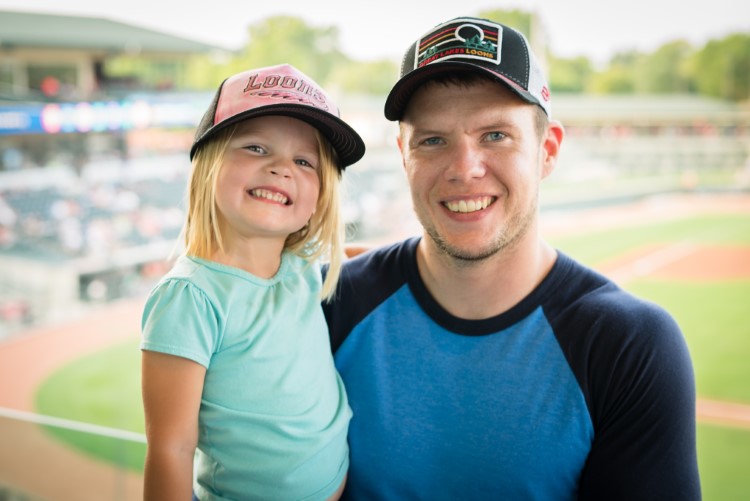 Ben Tierney and his daughter at a Loons game.