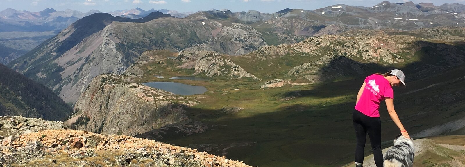 Dr. Ange Phillips hiking in Colorado wearing her "Live Like Reed" t-shirt